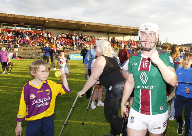 killian-doyle-celebrates-at-full-time-as-a-wexford-supporter-looks-for-an-autograph