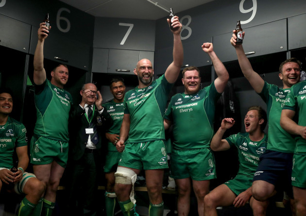 john-muldoon-celebrates-with-teammates-in-the-dressing-room-after-his-final-game