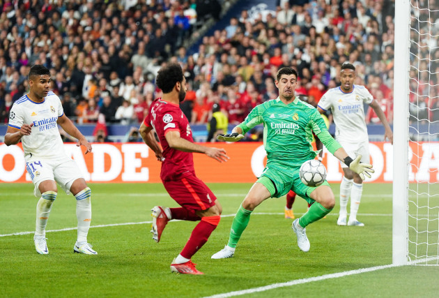 real-madrids-thibaut-courtois-saves-from-liverpools-mohamed-salah-during-the-uefa-champions-league-final-at-the-stade-de-france-paris-picture-date-saturday-may-28-2022