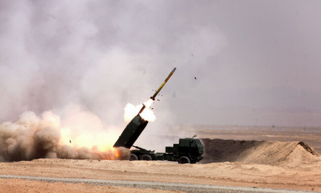 marines-with-romeo-battery-5th-battalion-11th-marine-regiment-regimental-combat-team-7-fire-rockets-from-a-m142-high-mobility-artillery-rocket-system-himars-on-camp-leatherneck-helmand-province