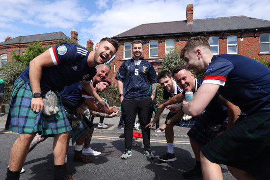 kilted-scottish-fans-point-at-the-trousers-of-alex-strang-from-falkirk-ahead-of-the-game