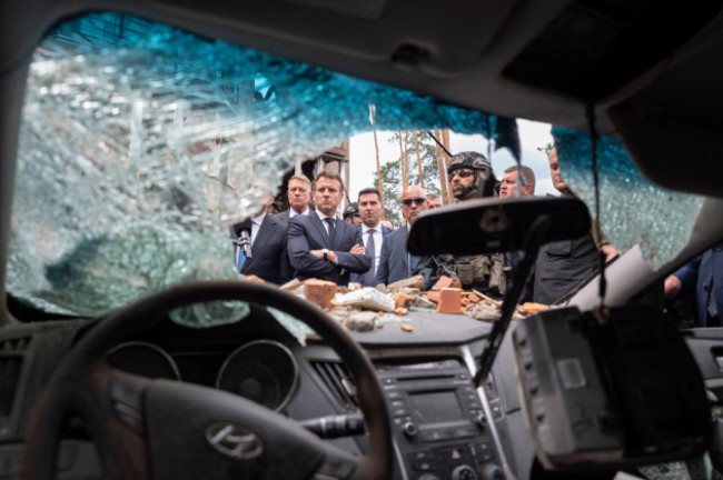 kyiv-region-ukraine-june-16-2022-french-president-emmanuel-macron-italian-prime-minister-mario-draghi-and-german-chancellor-olaf-scholz-walk-past-destroyed-buildings-in-irpin-kyiv-region-ukrain