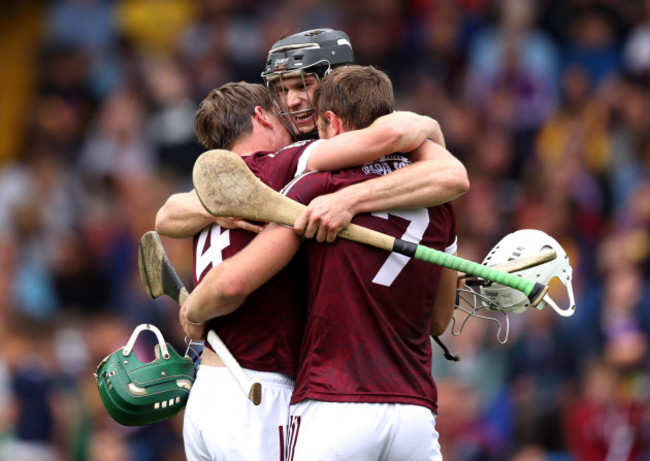 darren-morrissey-joseph-cooney-and-fintan-burke-celebrate-after-the-game