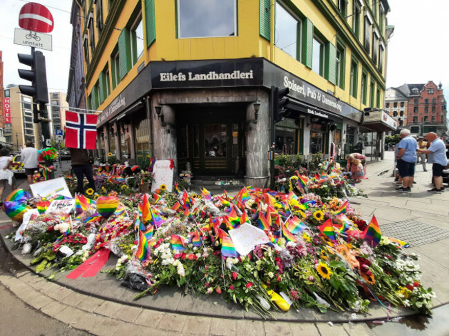 oslo-norway-26th-june-2022-flower-memorial-in-front-of-the-pubs-and-gay-bar-in-oslo-near-where-two-people-died-and-21-were-wounded-early-on-saturday-morning-in-what-has-been-described-by-the-norwe