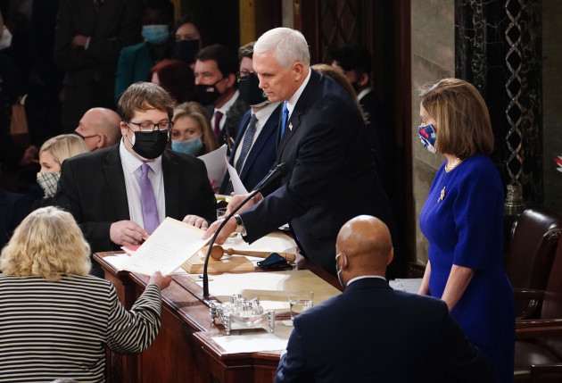 united-states-vice-president-mike-pence-and-speaker-of-the-united-states-house-of-representatives-nancy-pelosi-democrat-of-california-preside-over-the-electoral-college-vote-certification-for-presi