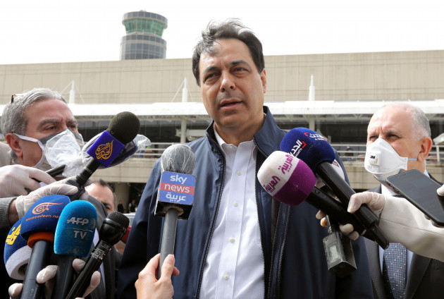 lebanese-prime-minister-hassan-diab-speaks-to-the-media-outside-beiruts-international-airport-lebanon-april-5-2020-reutersmohamed-azakir