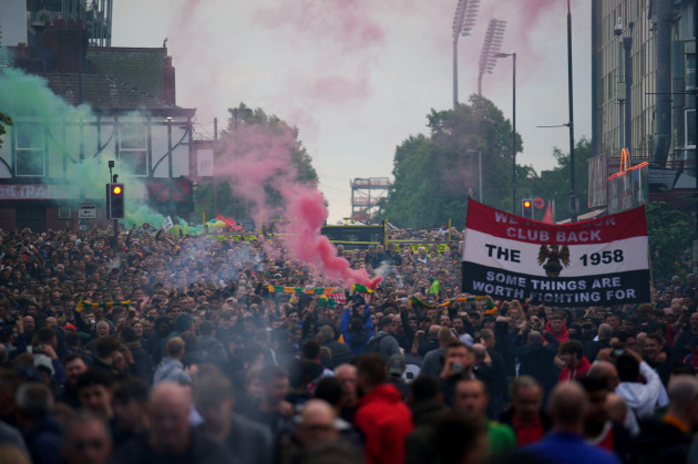 fans-take-part-in-an-organised-protest-march-outside-the-ground-against-the-manchester-united-owners-before-the-premier-league-match-against-liverpool-at-old-trafford-manchester-picture-date-monday
