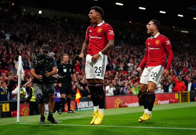 manchester-uniteds-jadon-sancho-celebrates-scoring-their-sides-first-goal-of-the-game-during-the-premier-league-match-at-old-trafford-manchester-picture-date-monday-august-22-2022