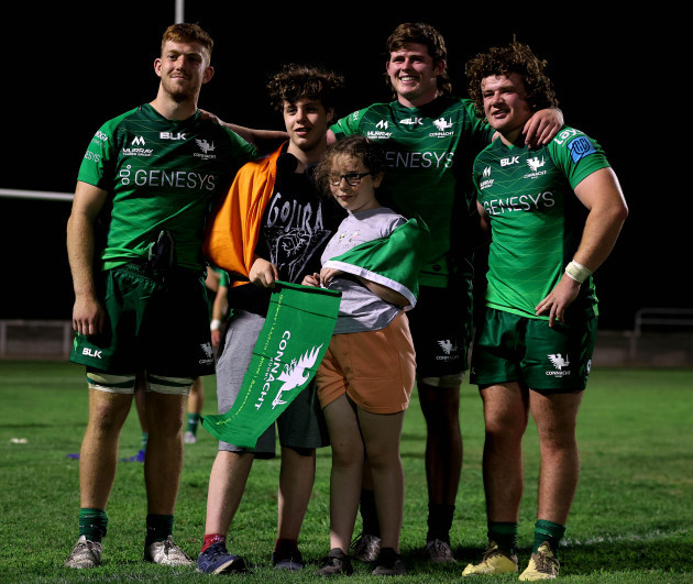 shamus-hurley-langton-sean-masterson-and-matthew-burke-pose-for-a-photo-with-a-fans