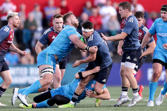 calvin-nash-is-tackled-by-ollie-thorley-and-ruan-ackermann