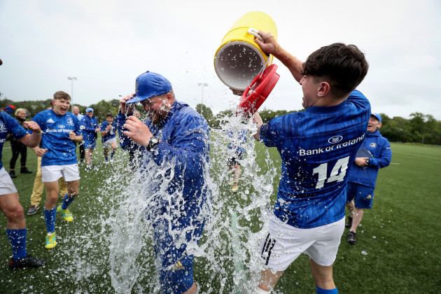 matthew-grogan-pours-water-over-andy-skehan-after-the-game