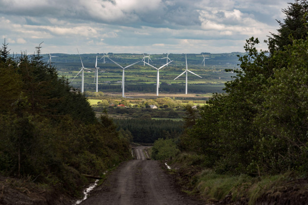 view-of-wind-turbine-farm-though-a-backroad-in-rural-north-county-kerry-ireland