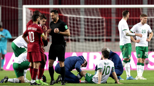 robbie-brady-receives-treatment-before-going-off-injured