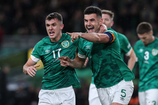 john-egan-celebrates-scoring-his-sides-first-goal-with-jason-knight