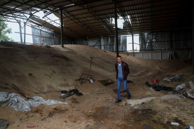 vitali-orlov-walks-inside-his-destroyed-grain-silos-amid-russias-attack-on-ukraine-in-the-village-of-nova-husarivka-recently-liberated-by-ukrainian-armed-forces-in-kharkiv-region-ukraine-septemb