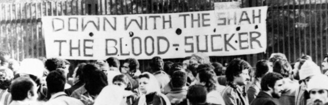 iranian-revolution-1979-nsign-at-tehran-university-protesting-the-government-of-the-shah-of-iran-1979