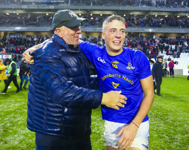 ger-cunningham-celebrates-with-his-son-ben-cunningham-at-the-end-of-the-game