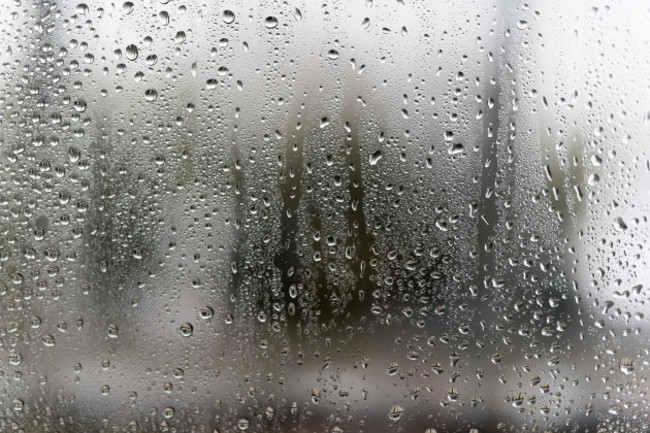 drops-fall-rain-on-window-abstract-blurred-background