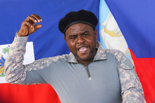 jimmy-barbecue-cherizier-leader-of-the-g9-coalition-of-gangs-in-the-metropolitan-area-of-port-au-prince-speaks-to-members-of-the-media-in-port-au-prince-haiti-october-26-2021-reutersralph-t