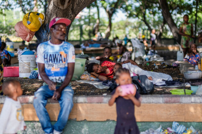 people-displaced-by-gang-war-violence-in-cite-soleil-take-refuge-at-the-hugo-chavez-square-transformed-into-a-shelter-living-in-inhumane-conditions-in-port-au-prince-haiti-october-16-2022-reutersr