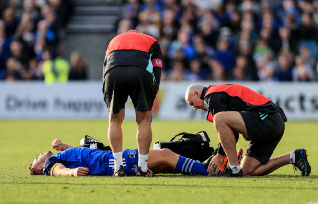 jordan-larmour-is-treated-for-an-injury-by-garreth-farrell