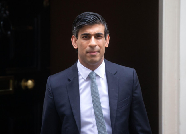 chancellor-of-the-exchequer-rishi-sunak-exits-number-11-with-the-famous-red-briefcase-before-heading-to-parliament-to-deliver-his-budget