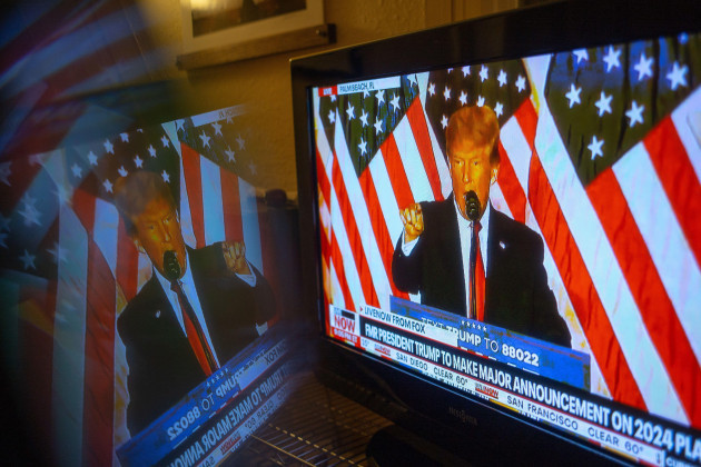 manhattan-kansas-usa-15th-nov-2022-former-us-president-donald-j-trump-reflected-from-a-tv-set-announces-his-bid-for-president-in-2024-at-mar-a-lago-tuesday-night-credit-image-luke-t