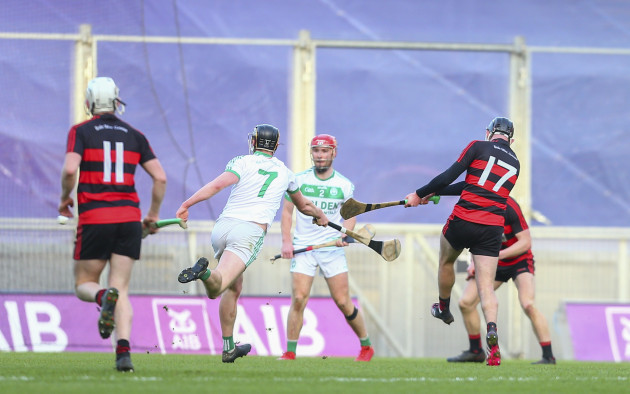 harry-ruddle-shoots-to-score-in-the-dying-seconds-despite-pressure-from-ballyhale-shamrocks-darragh-corcoran