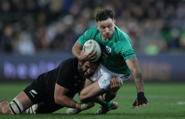 irelands-hugo-keenan-is-tackled-by-all-blacks-samuel-whitelock-1672022