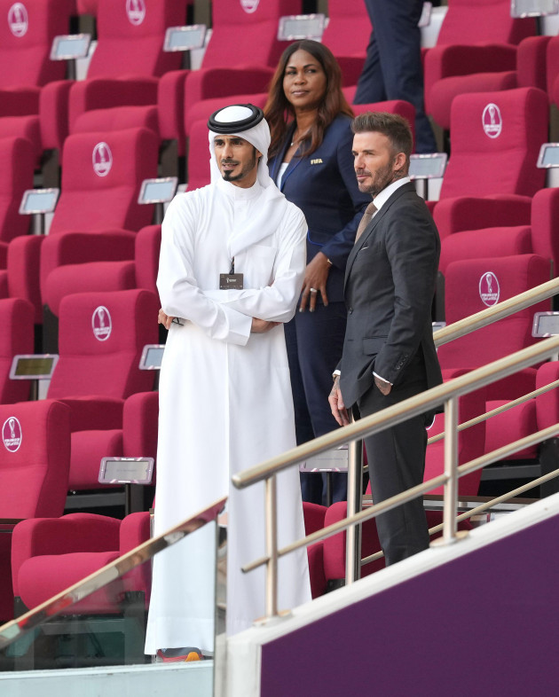 david-beckham-right-in-the-stands-before-the-fifa-world-cup-group-b-match-at-the-khalifa-international-stadium-in-doha-qatar-picture-date-monday-november-21-2022