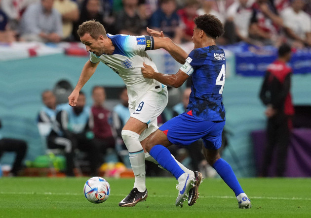 englands-harry-kane-and-usas-tyler-adams-right-battle-for-the-ball-during-the-fifa-world-cup-group-b-match-at-the-al-bayt-stadium-al-khor-picture-date-friday-november-25-2022