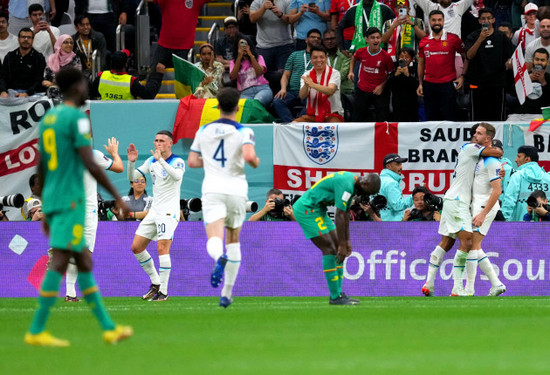 englands-jordan-henderson-right-celebrates-scoring-their-sides-first-goal-of-the-game-during-the-fifa-world-cup-round-of-sixteen-match-at-the-al-bayt-stadium-in-al-khor-qatar-picture-date-sunda