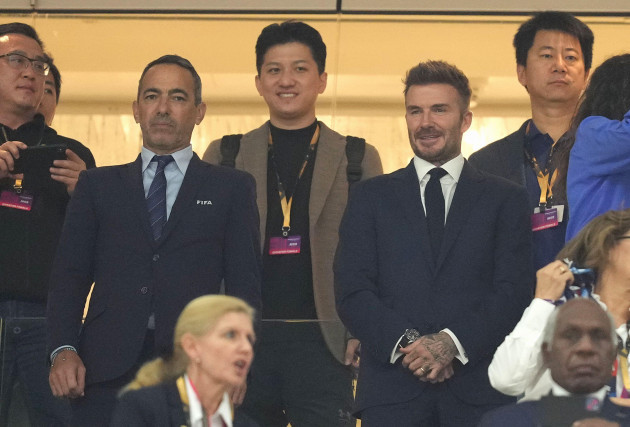 youri-djorkaeff-left-and-david-beckham-in-the-stands-before-the-fifa-world-cup-quarter-final-match-at-the-al-bayt-stadium-in-al-khor-qatar-picture-date-saturday-december-10-2022