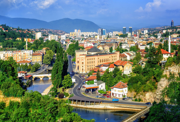 aerial-view-of-sarajevo-the-capital-of-bosnia-and-herzegovina-with-latin-bridge-miljacka-river-national-library-and-the-modern-city