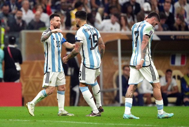 argentinas-lionel-messi-left-celebrates-scoring-their-sides-first-goal-of-the-game-from-the-penalty-spot-with-team-mates-nicolas-otamendi-and-rodrigo-de-paul-right-during-the-fifa-world-cup-fina