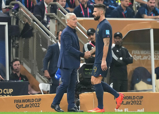 frances-olivier-giroud-right-looks-dejected-as-he-shake-hands-with-manager-didier-deschamps-after-being-substituted-off-during-the-fifa-world-cup-final-at-lusail-stadium-qatar-picture-date-sunda