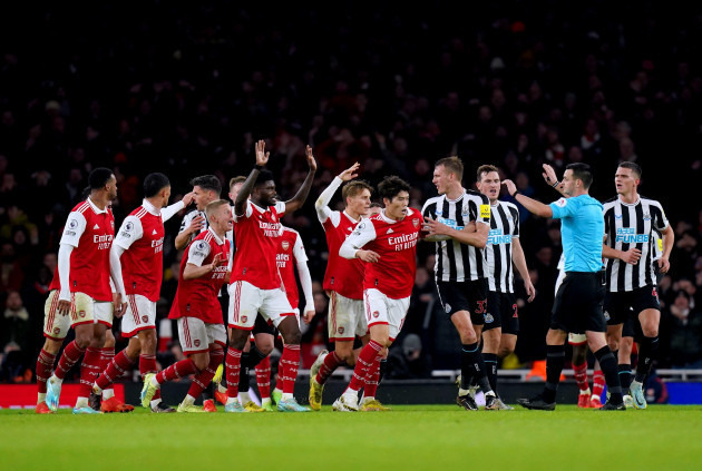 arsenal-players-surround-referee-andrew-madley-as-they-appeal-for-a-hand-ball-during-the-premier-league-match-at-the-emirates-stadium-london-picture-date-tuesday-january-3-2023