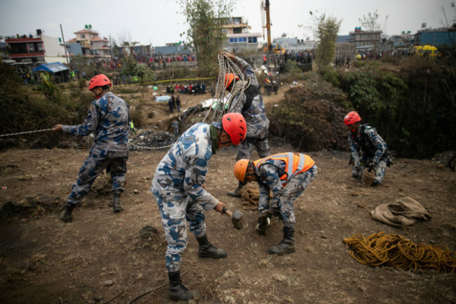 pokhara-nepal-24th-jan-2023-nepal-army-police-apf-police-rescuers-preparation-to-recover-the-body-of-a-victim-who-died-in-a-yeti-airlines-plane-crash-in-pokhara-nepal-observed-a-day-of-mourning
