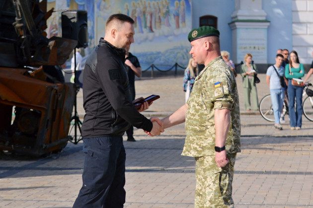 kyiv-ukraine-14th-june-2022-the-minister-of-internal-affairs-of-ukraine-denys-monastyrsky-presents-an-award-to-one-of-the-border-guards-rescuers-police-and-border-guards-have-shown-a-special-fea