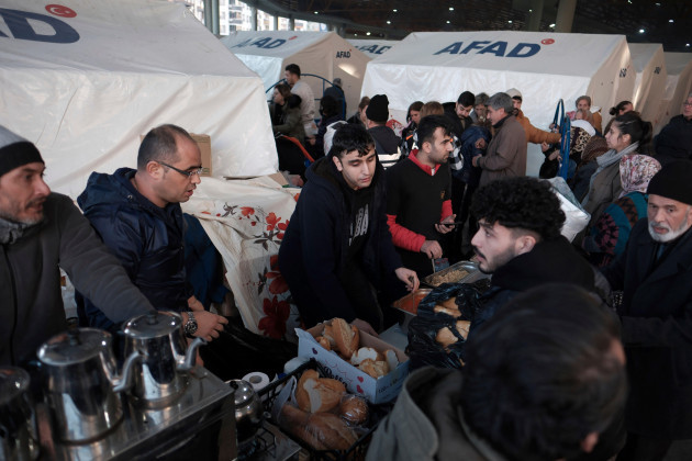 relief-supplies-are-offered-to-local-evacuated-residents-at-an-evacuation-facility-in-adana-in-south-central-turkey-on-feb-8-2023-the-devastating-earthquake-occurred-in-southern-turkey-and-syria-o