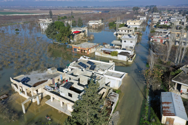 an-aerial-view-of-the-al-tlul-village-flooded-after-a-devastating-earthquake-destroyed-a-river-dam-in-the-town-of-salqeen-near-the-turkish-border-idlib-province-syria-thursday-feb-9-2023-ap-ph