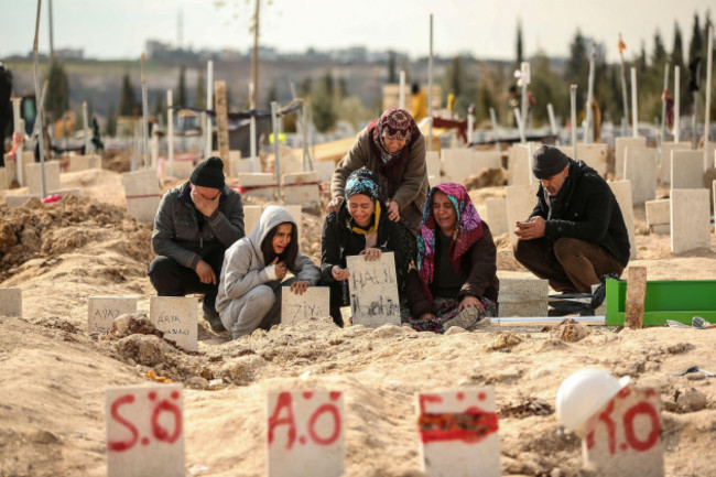 people-at-the-cemetery-as-they-bury-their-loved-ones-victims-of-monday-earthquake-in-adiyaman-turkey-friday-feb-10-2023-emergency-crews-made-a-series-of-dramatic-rescues-in-turkey-on-friday-p