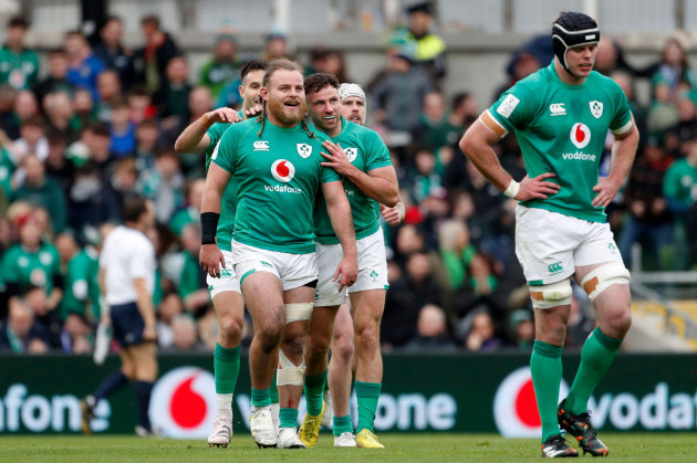 irelands-hugo-keenan-centre-left-celebrates-with-teammates-finlay-bealham-centre-after-scoring-a-try-during-the-six-nations-rugby-union-international-match-between-italy-and-france-at-aviva-stad
