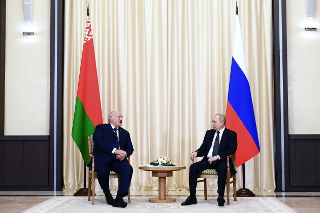 russian-president-vladimir-putin-right-and-belarusian-president-alexander-lukashenko-talk-during-their-meeting-at-the-novo-ogaryovo-state-residence-outside-moscow-russia-friday-feb-17-2023-v