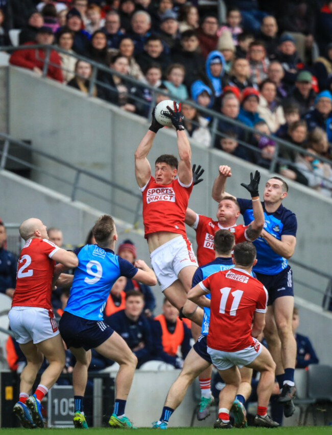 mattie-taylor-jumps-for-a-high-ball