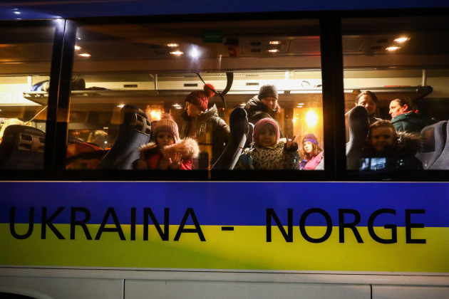 refugees-who-arrived-from-ukraine-are-seen-on-a-bus-leaving-to-norway-from-the-station-in-krakow-poland-on-march-17-2022-russian-invasion-on-ukraine-causes-a-mass-exodus-of-refugees-to-poland-pho