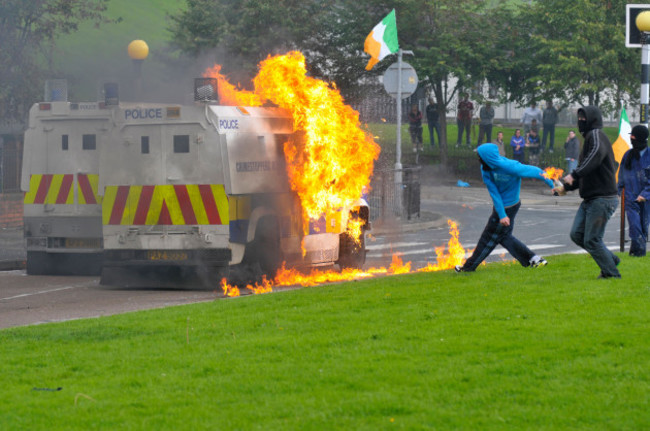 masked-nationalist-youths-throw-petrol-bombs-at-psni-vehicles-during-riots-in-bogide-londonderry