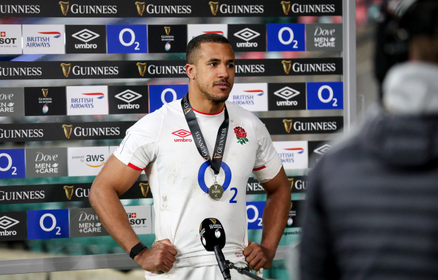 anthony-watson-is-presented-with-the-guinness-six-nations-player-of-the-match-award-after-the-game
