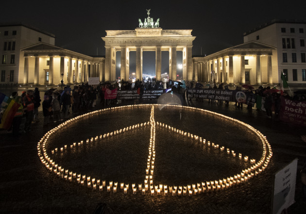 peace-sign-made-of-candles-in-front-of-brandenburg-gate