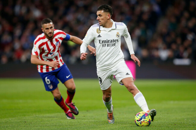 dani-ceballos-of-real-madrid-cf-and-koke-resurreccion-of-atletico-de-madrid-during-the-la-liga-match-between-real-madrid-and-atletico-de-madrid-played-at-santiago-bernabeu-stadium-on-february-25-2023